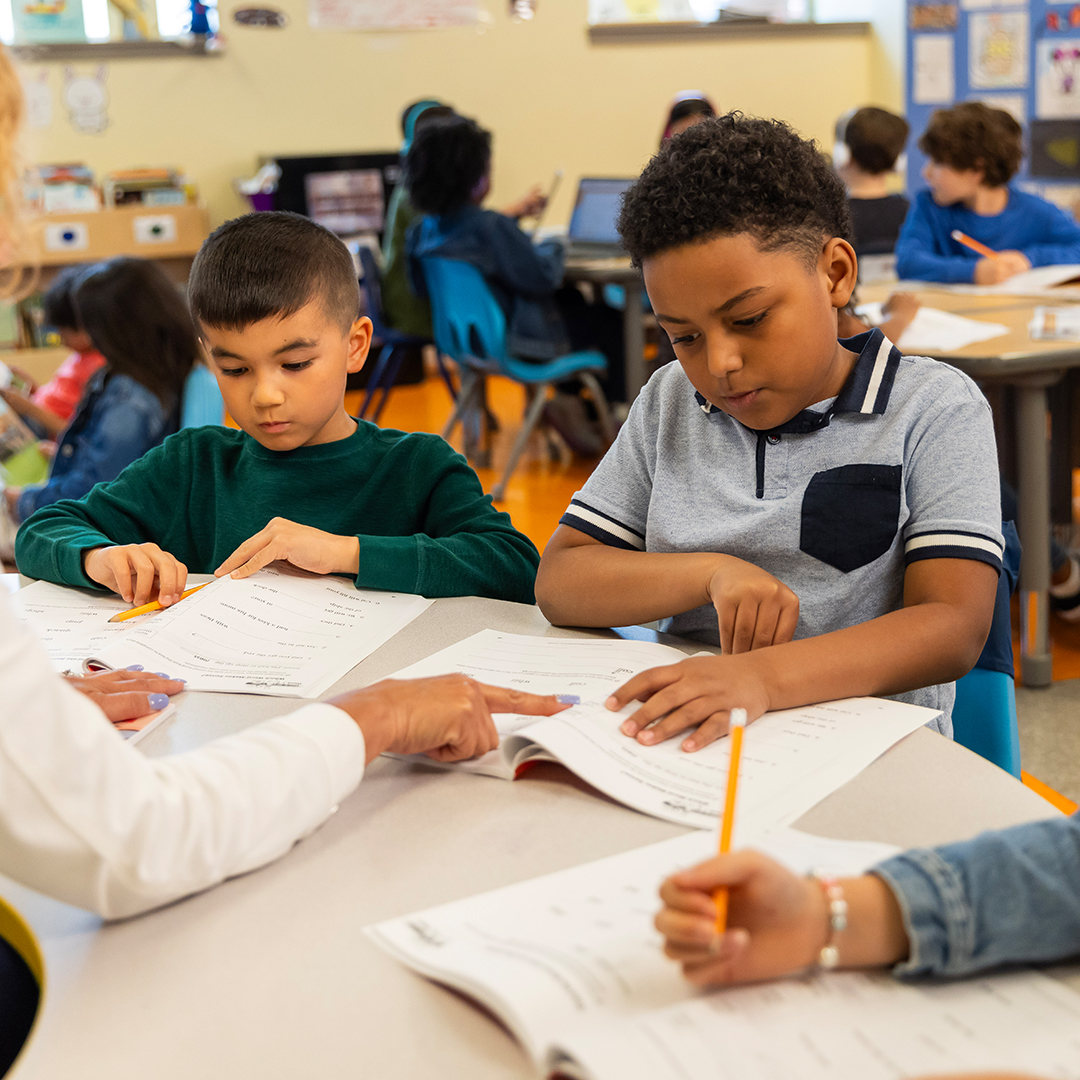 Students engaged in learning activities in a classroom program.