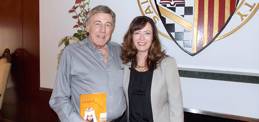 Author and man with book