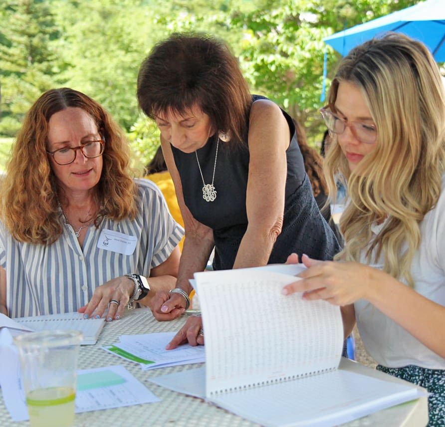 Wilson Reading System trainers review materials during development.