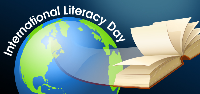 International Literacy Day: Globe and open book symbolizing global education and knowledge.